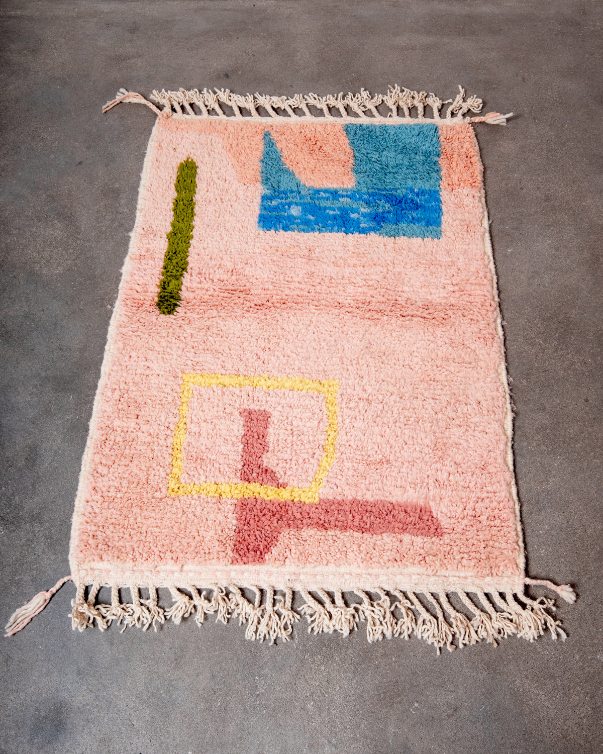 Modern, designer, handcrafted Berber rug from Morocco. Beniourain carpet with beautiful colours and patterns and fluffy wool texture.
